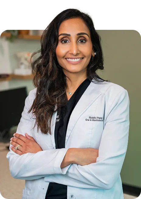 Dr. Riddhi Patel, board-certified oral and maxillofacial surgeon at Harmony